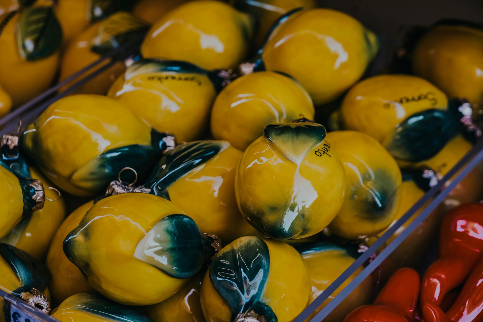 Vibrant ripe lemons on a bright yellow background, symbolizing renewed sensation and vitality